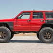 Load image into Gallery viewer, Rough Country Fender &amp; Quarter Panel Armor | Rear | Combo | Jeep Cherokee XJ 2WD/4WD (84-96) 10578 - Additional View 6