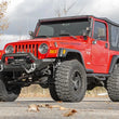 Load image into Gallery viewer, Rough Country Front Bumper | Rock Crawler | Jeep Wrangler TJ (97-06)/Wrangler Unlimited (04-06) 10595 - Installation View