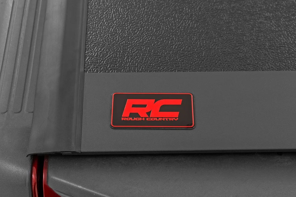 Rough Country Hard Low Profile Bed Cover | 5' Bed | Cargo Mgmt | Nissan Frontier (05-21) - Installation View
