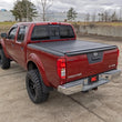 Load image into Gallery viewer, Rough Country Hard Low Profile Bed Cover | 5' Bed | Cargo Mgmt | Nissan Frontier (05-21) - Additional View 6