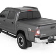 Load image into Gallery viewer, Rough Country Hard Low Profile Bed Cover | 5' Bed | Toyota Tacoma 2WD/4WD (05-15) 47415500B - Back View