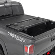 Load image into Gallery viewer, Rough Country Hard Low Profile Bed Cover | 6' Bed | Toyota Tacoma 2WD/4WD (2016-2023) - Side View