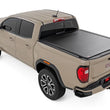 Load image into Gallery viewer, Rough Country Hard Roll Up Bed Cover | 5' Bed | Chevy/GMC Canyon/Colorado 2WD/4WD (23-25) - Back View