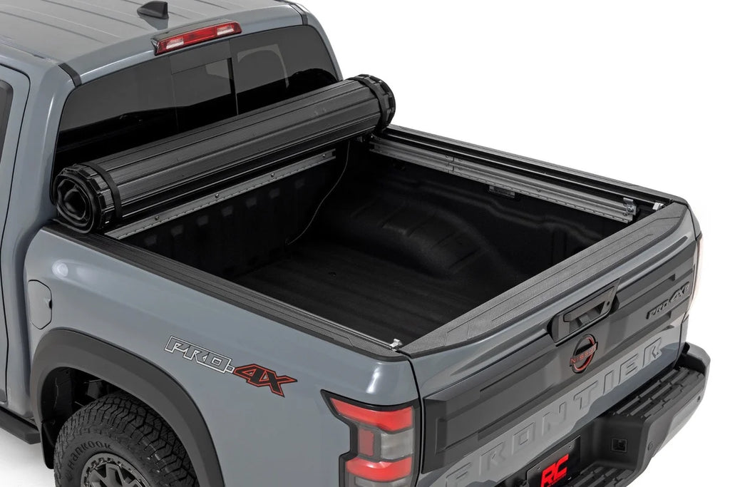 Rough Country Hard Roll Up Bed Cover | 5' Bed | Nissan Frontier 2WD/4WD (2022-2025) - Side View