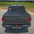 Load image into Gallery viewer, Rough Country Hard Roll Up Bed Cover | 5' Bed | Toyota Tacoma 2WD/4WD (2016-2023) - Installation View