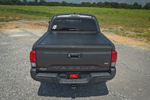 Load image into Gallery viewer, Rough Country Hard Roll Up Bed Cover | 5' Bed | Toyota Tacoma 2WD/4WD (2016-2023) - Installation View