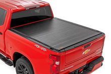 Load image into Gallery viewer, Rough Country Hard Roll Up Bed Cover | 5'10" Bed | Chevy/GMC Sierra 1500 (19-26)/Silverado 1500 (19-26) - Main Product View