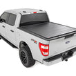 Load image into Gallery viewer, Rough Country Hard Roll Up Bed Cover | 5'7" Bed | Ford F-150 (15-25)/F-150 Lightning (22-25) - Installation View