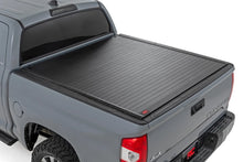 Load image into Gallery viewer, Rough Country Hard Roll Up Bed Cover | 5'7" Bed | Toyota Tundra (07-21) - Main Product View