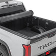 Load image into Gallery viewer, Rough Country Hard Roll Up Bed Cover | 5'7" Bed | Toyota Tundra 2WD/4WD (2022-2026) - Side View