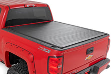 Load image into Gallery viewer, Rough Country Hard Roll Up Bed Cover | 5'9" Bed | Chevy/GMC 1500 (14-18 &amp; Classic) - Main Product View
