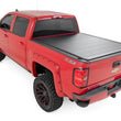 Load image into Gallery viewer, Rough Country Hard Roll Up Bed Cover | 5'9" Bed | Chevy/GMC 1500 (14-18 &amp; Classic) - Back View