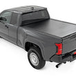 Load image into Gallery viewer, Rough Country Hard Roll Up Bed Cover | 6' Bed | Toyota Tacoma 2WD/4WD (2024-2026) - Back View
