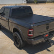 Load image into Gallery viewer, Rough Country Hard Roll Up Bed Cover | 6'4" Bed | Ram 1500 (09-18)/2500 (09-26) - Additional View 5
