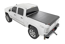 Load image into Gallery viewer, Rough Country Hard Roll Up Bed Cover | 6'7" Bed | Chevy/GMC Sierra/Silverado 1500 (07-13) - Installation View