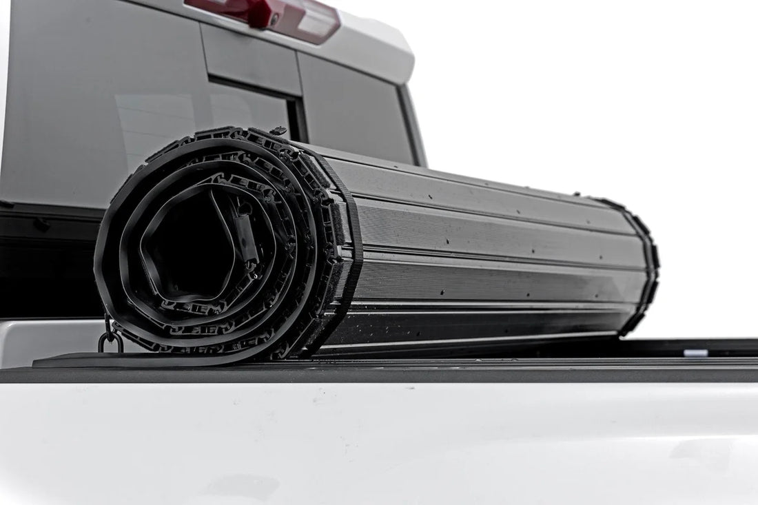 Rough Country Hard Roll Up Bed Cover | 6'9" Bed | Chevy/GMC  Silverado/Sierra 2500HD/3500HD (20-26) - Installation View