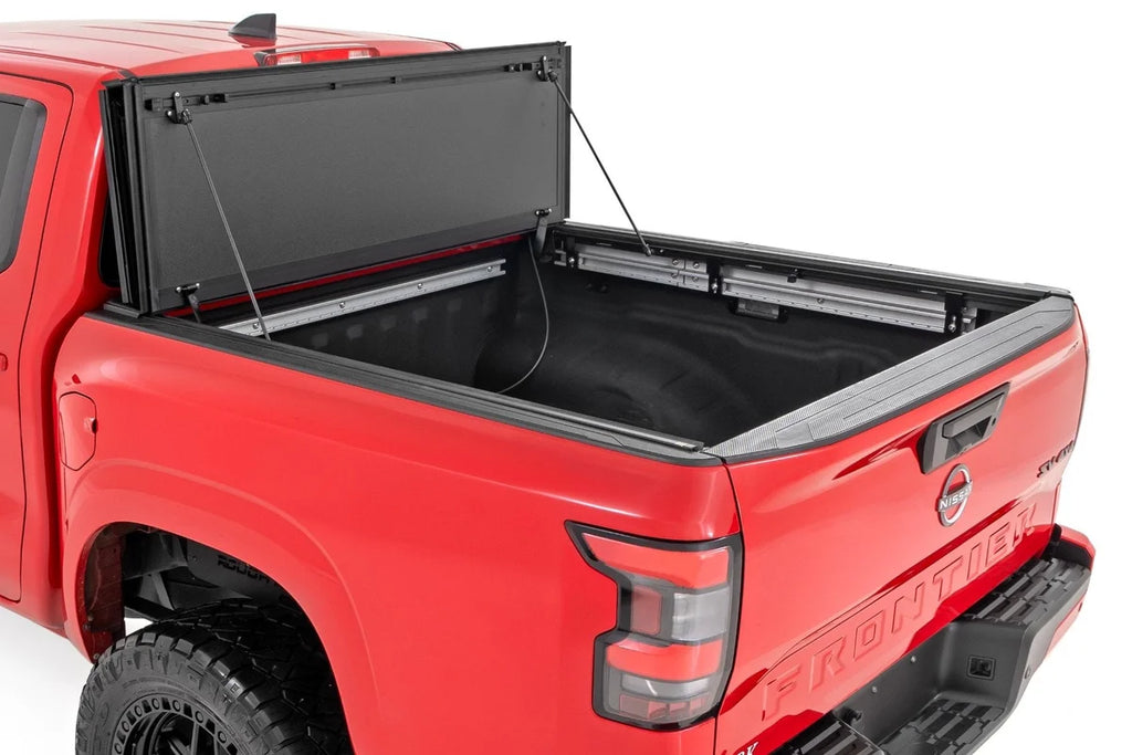 Rough Country Hard Tri-Fold Flip Up Bed Cover | 5' Bed | Nissan Frontier 2WD/4WD (22-26) - Side View