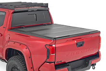Load image into Gallery viewer, Rough Country Hard Tri-Fold Flip Up Bed Cover | 5' Bed | Toyota Tacoma 2WD/4WD (2024-2026) - Main Product View