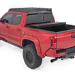Load image into Gallery viewer, Rough Country Hard Tri-Fold Flip Up Bed Cover | 5' Bed | Toyota Tacoma 2WD/4WD (2024-2026) - Installation View