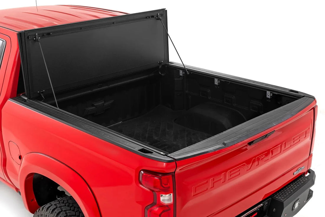 Rough Country Hard Tri-Fold Flip Up Bed Cover | 5'10" Bed | Chevy/GMC 1500 (19-24) 49120580 - Side View