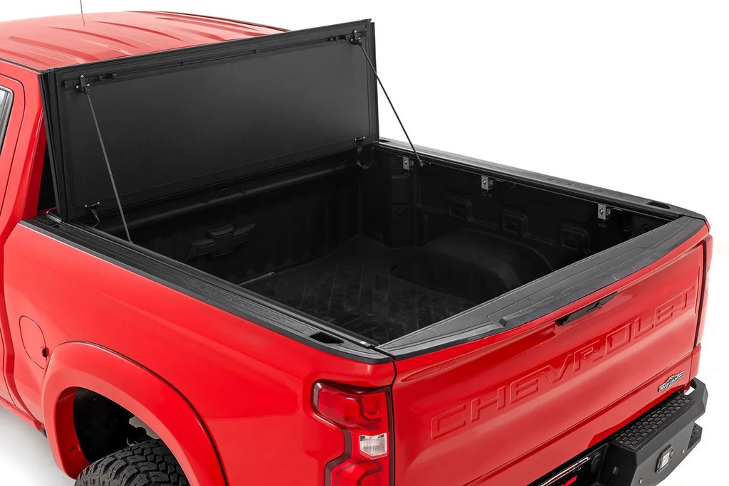Rough Country Hard Tri-Fold Flip Up Bed Cover | 5'10" Bed | Chevy/GMC 1500 (19-24) 49120580 - Side View