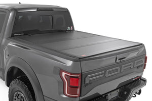 Rough Country Hard Tri-Fold Flip Up Bed Cover | 5'7" Bed | Ford F-150 (21-24)/F-150 Lightning (22-24) 49221550 - Main Prod...