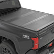 Load image into Gallery viewer, Rough Country Hard Tri-Fold Flip Up Bed Cover | 6' Bed | Toyota Tacoma 2WD/4WD (2024-2026) - Main Product View