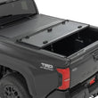 Load image into Gallery viewer, Rough Country Hard Tri-Fold Flip Up Bed Cover | 6' Bed | Toyota Tacoma 2WD/4WD (2024-2026) - Side View