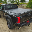 Load image into Gallery viewer, Rough Country Hard Tri-Fold Flip Up Bed Cover | 6' Bed | Toyota Tacoma 2WD/4WD (2024-2026) - Additional View 6