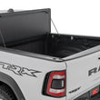 Load image into Gallery viewer, Rough Country Hard Tri-Fold Flip Up Bed Cover | 6'4" | Ram 1500 (19-25)/1500 TRX (21-24) 49320650 - Side View