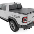 Load image into Gallery viewer, Rough Country Hard Tri-Fold Flip Up Bed Cover | 6'4" | Ram 1500 (19-25)/1500 TRX (21-24) 49320650 - Detail View