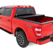 Load image into Gallery viewer, Rough Country Hard Tri-Fold Flip Up Bed Cover | 6'7" Bed | Ford F-150 2WD/4WD (2015-2020) - Installation View