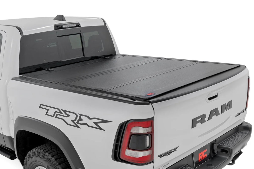 Rough Country Hard Tri-Fold Flip Up Fold Bed Cover | 5'7" Bed | Ram 1500 (19-25)/1500 TRX (21-24) 49320550 - Main Product ...