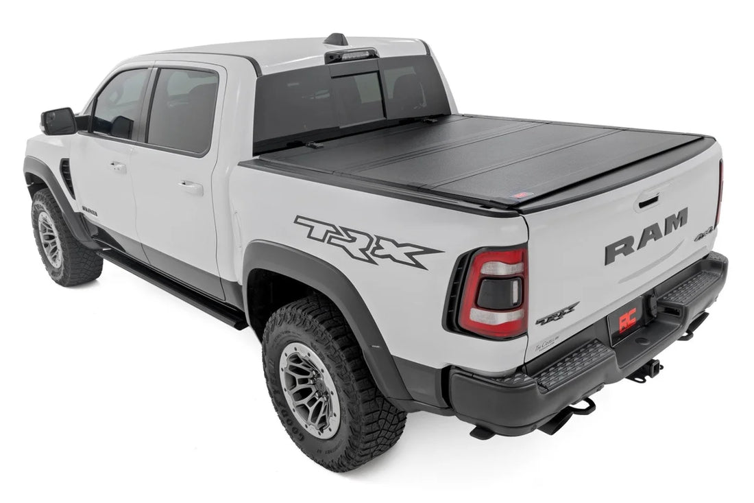 Rough Country Hard Tri-Fold Flip Up Fold Bed Cover | 5'7" Bed | Ram 1500 (19-25)/1500 TRX (21-24) 49320550 - Detail View