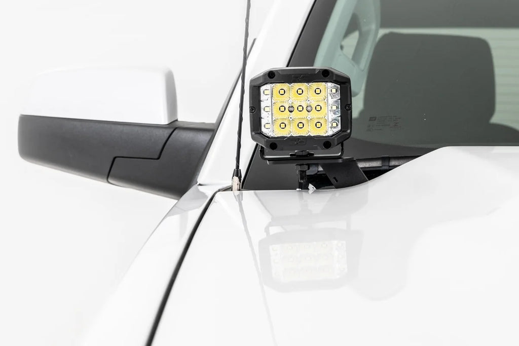 Rough Country LED Ditch Light Kit | 2in Black Pair | White DRL | Chevy/GMC 1500 (14-18 & Classic) 71054 - Side View
