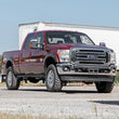 Load image into Gallery viewer, Rough Country LED Light Kit | Fog Mount | 2" Black Pair | Ford F-250/F-350 Super Duty (11-16) 70622 - Front View