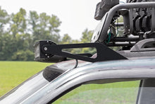 Load image into Gallery viewer, Rough Country LED Light Mount | Upper Windshield | 50" Curved | Jeep Grand Cherokee ZJ (93-98) 70567 - Installation View