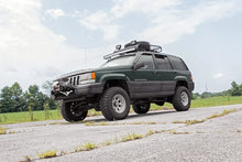 Load image into Gallery viewer, Rough Country LED Light Mount | Upper Windshield | 50" Curved | Jeep Grand Cherokee ZJ (93-98) 70567 - Installation View