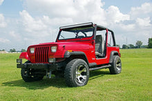 Load image into Gallery viewer, Rough Country LED Light Mount | Upper Windshield | 50" Straight | Jeep Wrangler YJ (87-95) 70508 - Installation View