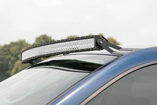 Load image into Gallery viewer, Rough Country LED Light Mount | Upper Windshield | 54" Curved | Dodge 1500 2WD/4WD (02-08) 70538 - Installation View