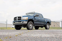Load image into Gallery viewer, Rough Country LED Light Mount | Upper Windshield | 54" Curved | Dodge 1500 2WD/4WD (02-08) 70538 - Installation View