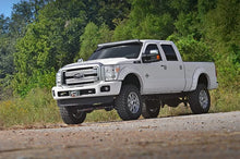Load image into Gallery viewer, Rough Country LED Light Mount | Upper Windshield | 54" Curved | Ford F-250/F-350 Super Duty (99-16) 70516 - Installation View