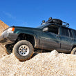 Load image into Gallery viewer, Rough Country Long Arm Upgrade Kit | 4 Inch Lift | Jeep Grand Cherokee ZJ 4WD (1993-1998) 90200U - Installation View
