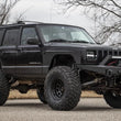 Load image into Gallery viewer, Rough Country Lower Door Armor | 4 Door | Jeep Cherokee XJ 2WD/4WD (1984-2001) 10582 - Installation View