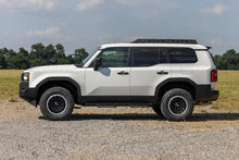 Load image into Gallery viewer, Rough Country M1R Reservoir Loaded Struts | 2 Inch | Front | Toyota Land Cruiser 4WD (24-25) - Installation View