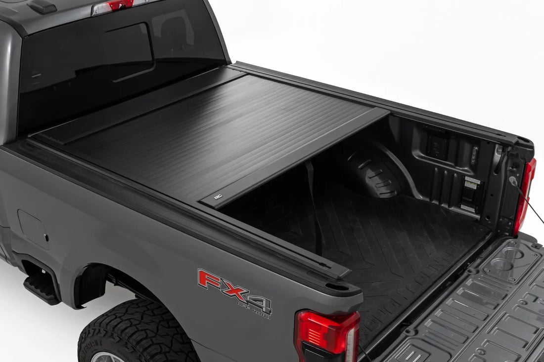 Rough Country Manual Retractable Bed Cover | 6'10" Bed | 53507650 fits 2017-2026 Ford F-250 Super Duty, F-350 Super Duty - Side Vie...