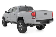 Load image into Gallery viewer, Rough Country Nerf Steps | Cab Length | Crew Cab | 5' Bed | Toyota Tacoma 2WD/4WD (05-23) - Installation View