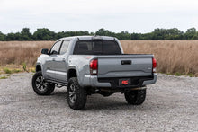 Load image into Gallery viewer, Rough Country Nerf Steps | Cab Length | Crew Cab | 5' Bed | Toyota Tacoma 2WD/4WD (05-23) - Installation View