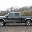 Load image into Gallery viewer, Rough Country Oval Nerf Step | Crew Cab | Black | Ford F-250/F-350 Super Duty (99-16) 21013 - Additional View 6