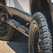 Load image into Gallery viewer, Rough Country Oval Nerf Steps | Black | Toyota Land Cruiser 4WD (2024-2025) - Back View